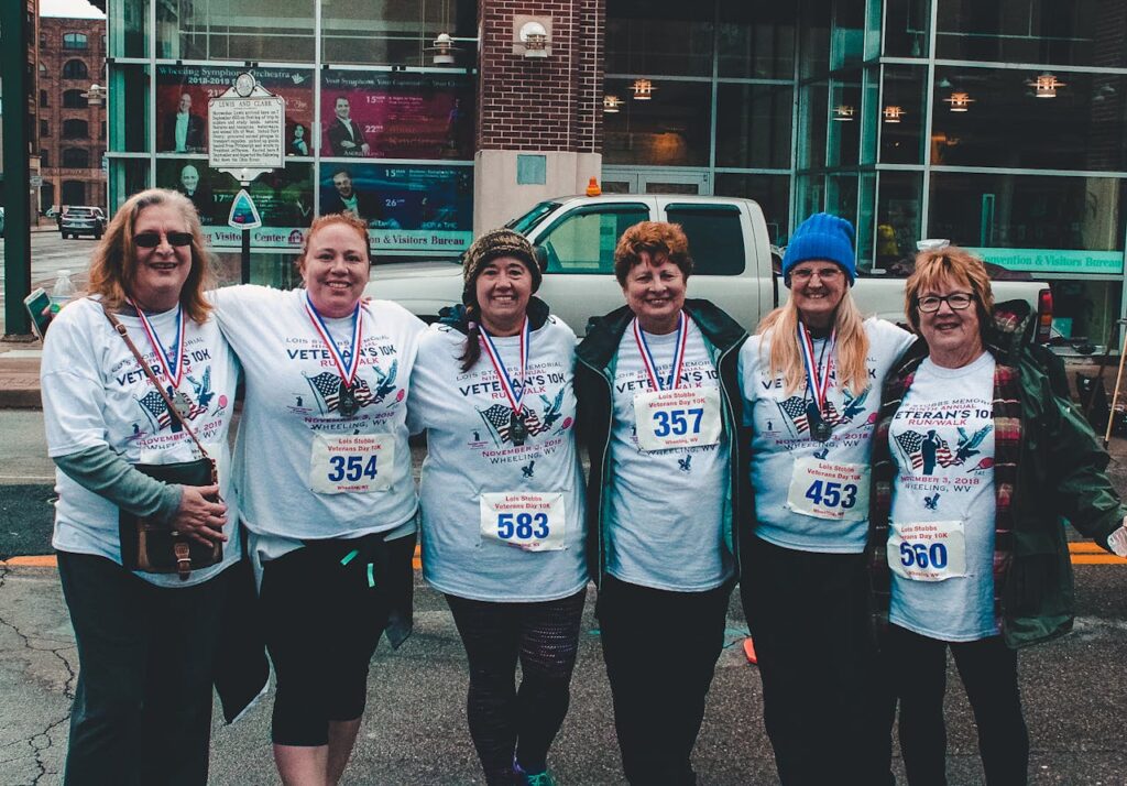 Group of Women Standing Outdoor during Day